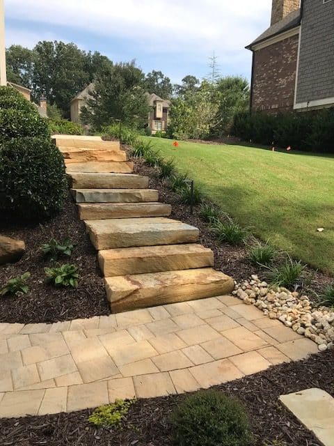 Crab Orchard steps with Stonehurst pavers in Sand Dune color